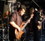 Campbell, on Bass and Didgeridoo, Vocals